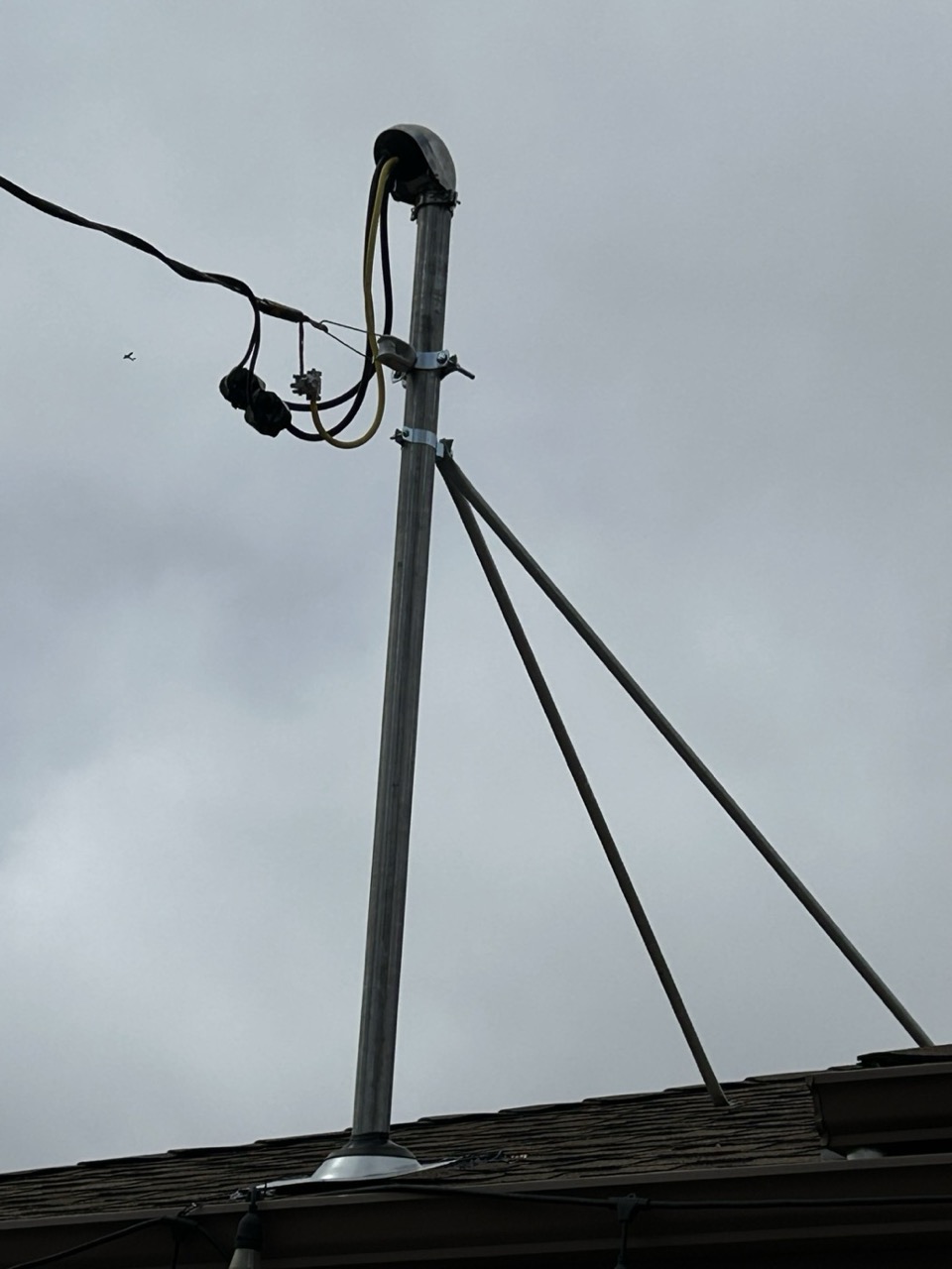 Overhead service riser and weatherhead